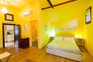 Postel nebo postele na pokoji v ubytování B&B Corte delle Muse