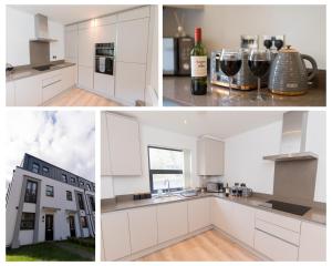 a kitchen with white cabinets and a bottle of wine at The Broad Oaks in Olton