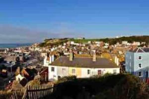 a view of a city with a white house at Hastings Old Town. Cottage - by the sea in Hastings