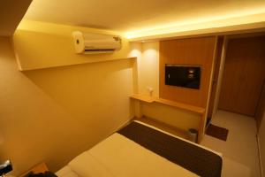 TV a/nebo společenská místnost v ubytování HOTEL BOSTON