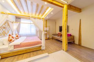 GeGeHouse - Lijiang Old Town客房内的一张或多张床位