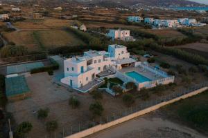 an aerial view of a house with a swimming pool at Naxos Affinity Villas in Maragkas