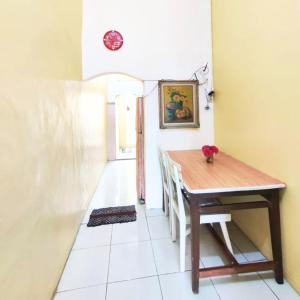 Kjøkken eller kjøkkenkrok på Rumah Teman Homestay