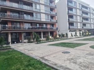 an empty courtyard in front of a building at Aglaya 2 - Pomorie Bay in Pomorie
