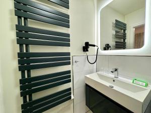 Koupelna v ubytování Hotel Residenz WALDOASE + 37 fotografií