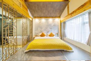 GeGeHouse - Lijiang Old Town客房内的一张或多张床位