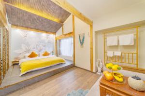 GeGeHouse - Lijiang Old Town客房内的一张或多张床位