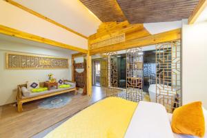 GeGeHouse - Lijiang Old Town客房内的一张或多张床位