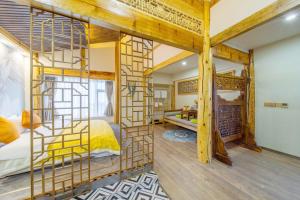 GeGeHouse - Lijiang Old Town客房内的一张或多张床位