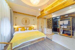 GeGeHouse - Lijiang Old Town客房内的一张或多张床位