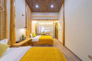 GeGeHouse - Lijiang Old Town客房内的一张或多张床位