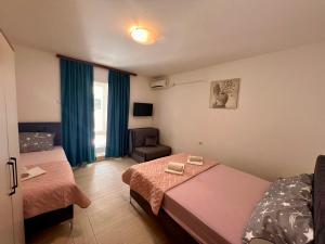 Postel nebo postele na pokoji v ubytování Guesthouse Civovic