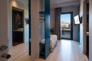 Koupelna v ubytování Essence Hotel