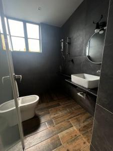 Bilik mandi di 3 Rooms Family Suite at Costa Mahkota by Velmount Group