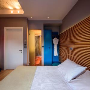 Postel nebo postele na pokoji v ubytování Essence Hotel