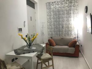 Posezení v ubytování Charming apartment in Ribera with mountain view – 40.2 m²