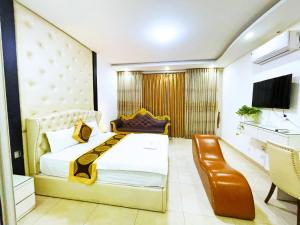 Postel nebo postele na pokoji v ubytování Binh Nguyen Hotel 2