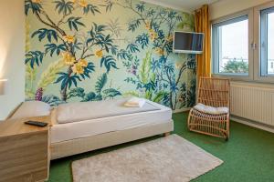 Postel nebo postele na pokoji v ubytování WannerHus Hotel