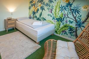 Postel nebo postele na pokoji v ubytování WannerHus Hotel