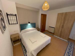 Postel nebo postele na pokoji v ubytování Sueños de Lorca Guest House