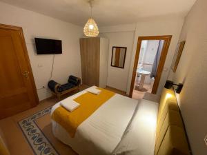Postel nebo postele na pokoji v ubytování Sueños de Lorca Guest House