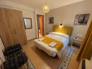 Postel nebo postele na pokoji v ubytování Sueños de Lorca Guest House