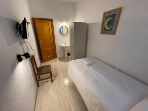 Postel nebo postele na pokoji v ubytování Sueños de Lorca Guest House