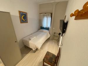 Postel nebo postele na pokoji v ubytování Sueños de Lorca Guest House
