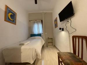 TV a/nebo společenská místnost v ubytování Sueños de Lorca Guest House + 37 fotografií