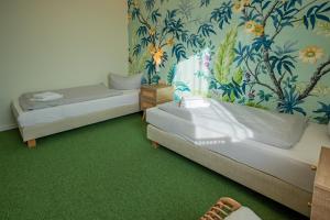 Postel nebo postele na pokoji v ubytování WannerHus Hotel