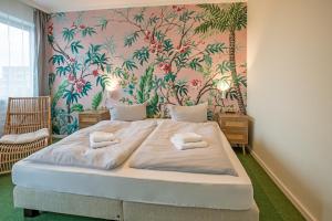 Postel nebo postele na pokoji v ubytování WannerHus Hotel