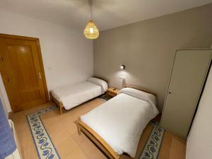 Postel nebo postele na pokoji v ubytování Sueños de Lorca Guest House