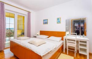 Posteľ alebo postele v izbe v ubytovaní 1 Bedroom Cozy Apartment In Krk