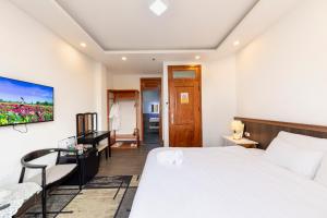 Postel nebo postele na pokoji v ubytování Olagi Hotel 2