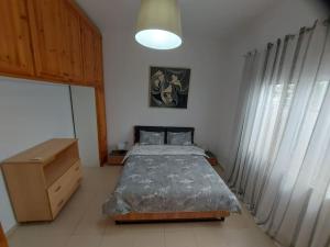 Postel nebo postele na pokoji v ubytování Κατάλυμα στην πόλη Χαλάνδρι