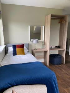 Voodi või voodid majutusasutuse Doolin Village Accomodation toas