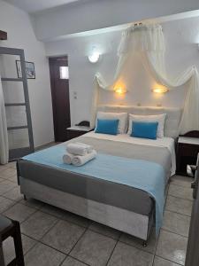 Ένα ή περισσότερα κρεβάτια σε δωμάτιο στο Hotel Leta 