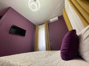 Postel nebo postele na pokoji v ubytování HOTEL VILA 15 - CENTER
