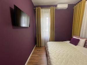 Postel nebo postele na pokoji v ubytování HOTEL VILA 15 - CENTER
