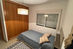 Postel nebo postele na pokoji v ubytování Apto a 1 min de la playa