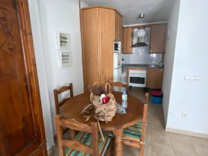 Η κουζίνα ή μικρή κουζίνα στο Apartamento Centro Aguamarga +9 φωτογραφίες