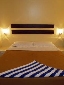 Ένα ή περισσότερα κρεβάτια σε δωμάτιο στο HOTEL GOLDEN PALACE PVT LTD