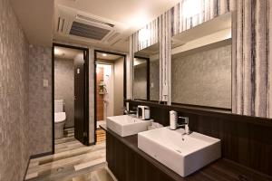 Koupelna v ubytování Hotel Tomariya Ueno