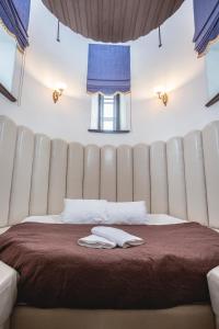 Postel nebo postele na pokoji v ubytování Alatskivi Castle