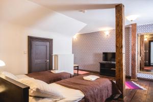 Postel nebo postele na pokoji v ubytování Alatskivi Castle