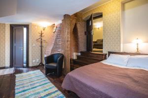 Postel nebo postele na pokoji v ubytování Alatskivi Castle