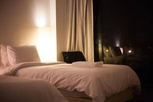 Postel nebo postele na pokoji v ubytování BED Changkian - Adults Only