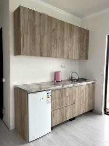 Una cocina o cocineta en Ak Line