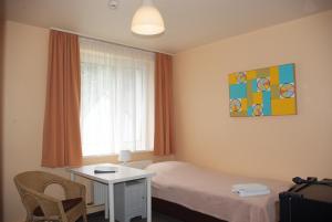 Postel nebo postele na pokoji v ubytování Apartmentpension Am Krongut + 8 fotografií