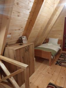 Vila Dobar Pogled tesisinde bir odada yatak veya yataklar